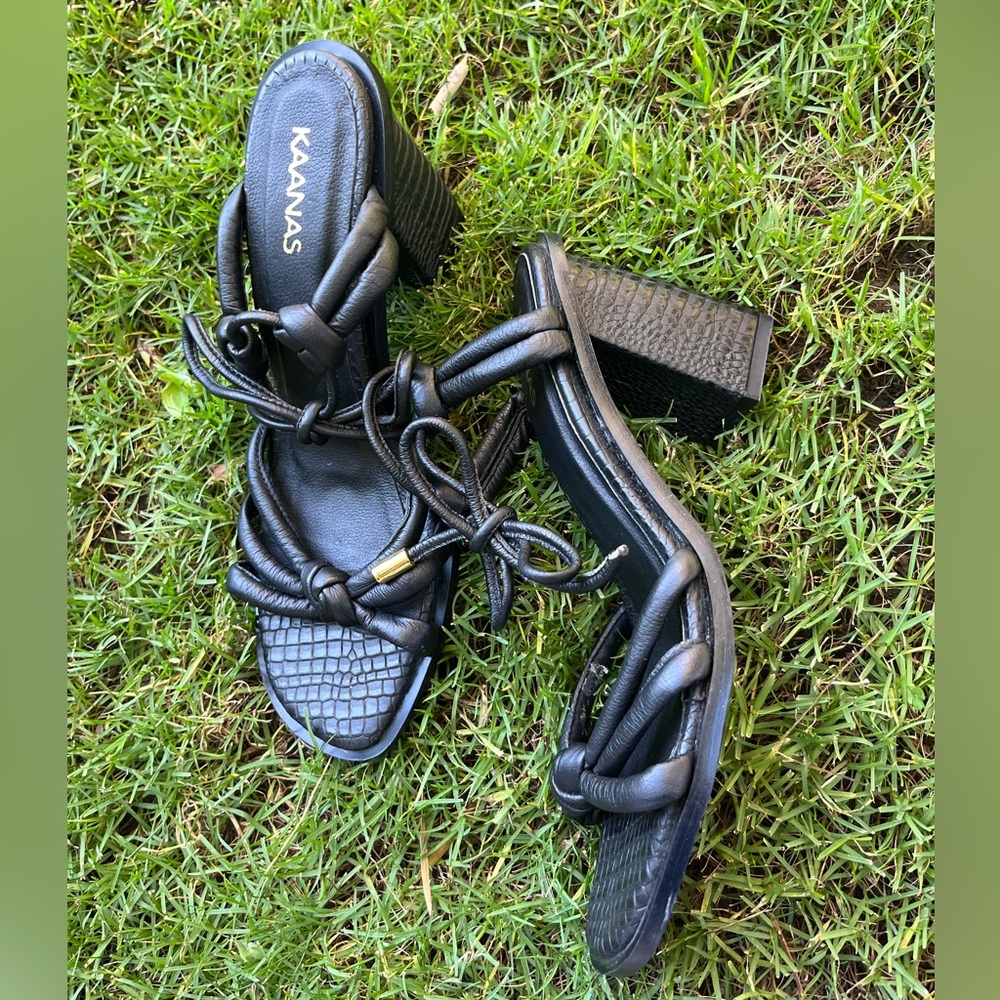 Kaanas Anthropologie black block heel • knotted and ankle straps • animal print